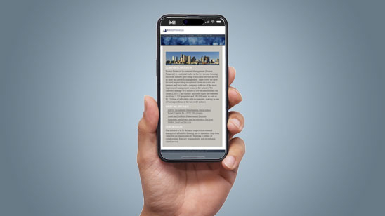 Hand holding a smartphone displaying the mobile version of the Builders Fence Company website, featuring a skyline image above a paragraph of text describing the company’s services and experience.